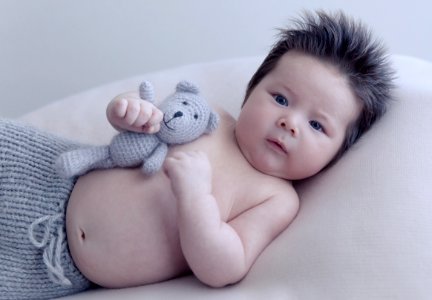 Infant Boy With Toy photo