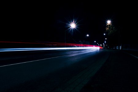 Car Headlights Approaching At Night photo
