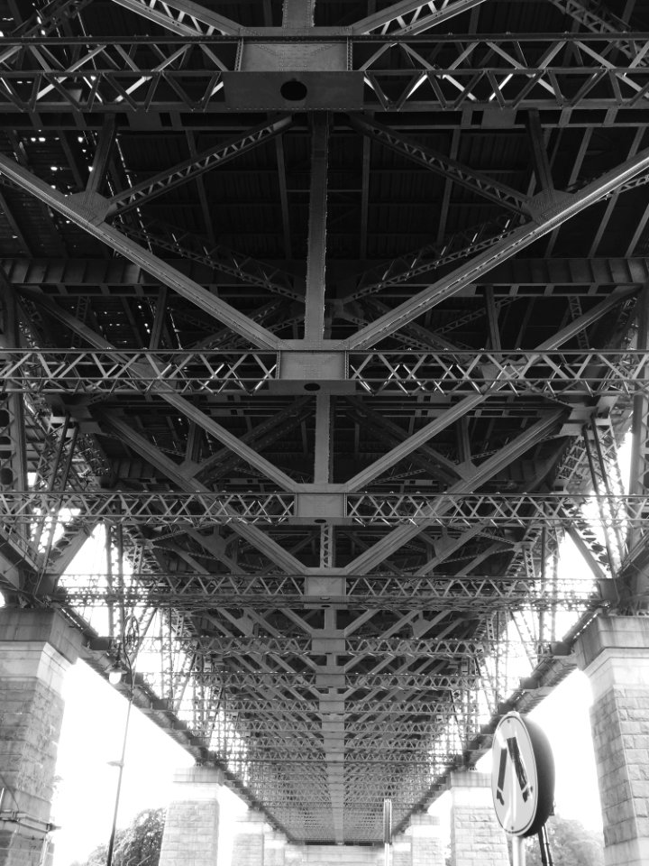 Grayscale Photo Of Bridge Frame