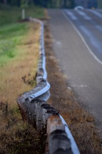 Wooden Small Fences Along The Road photo