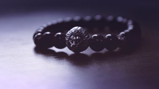 Black Beaded Lion Pendant Bracelet photo