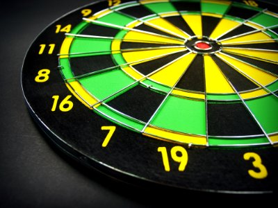 Green Yellow And Black Dartboard photo