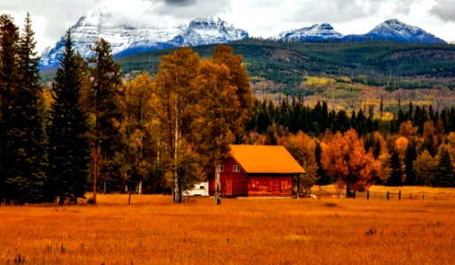 Wooden Cabin In Mountain Valley