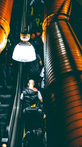 Photo Of People Using Escalator Inside A Building