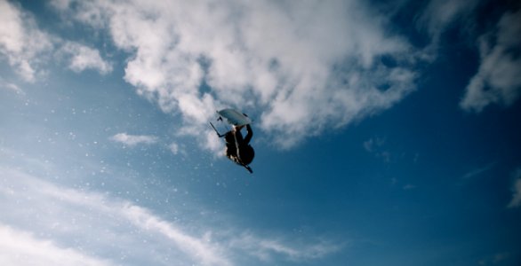 Low Angle Photo Of Wakeboarder In The Sky photo