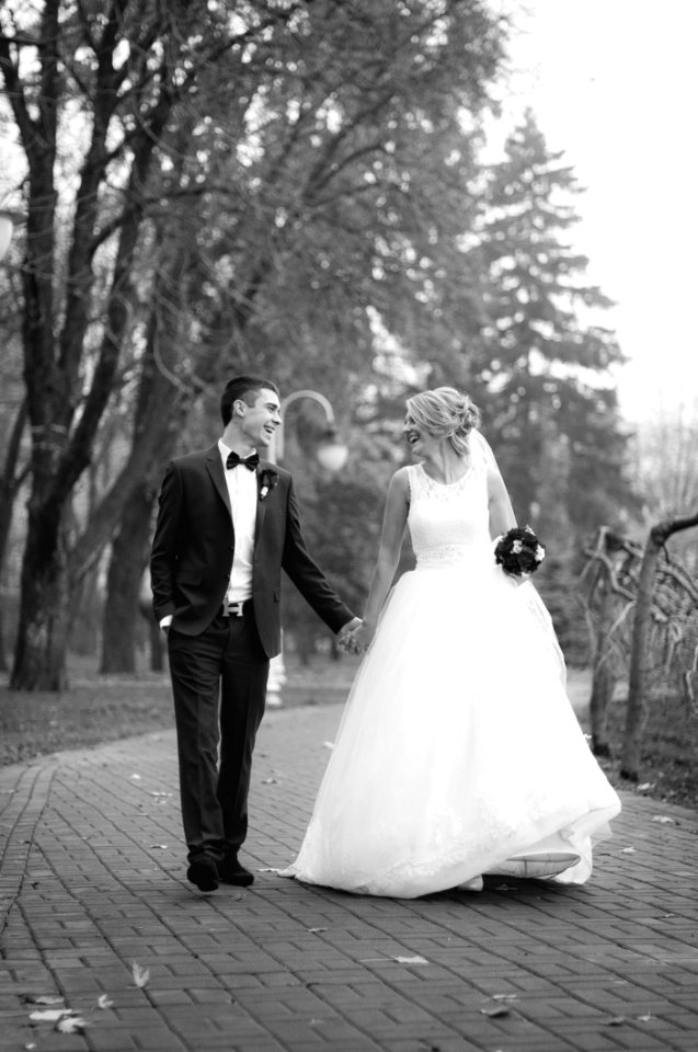 Woman And Man Walking At Park