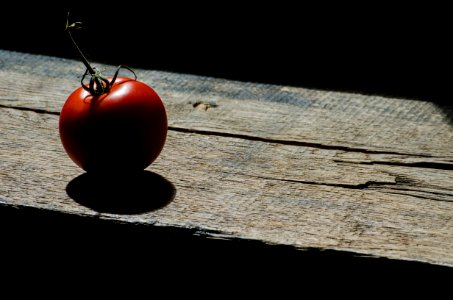 Tomato On Wooden Plank