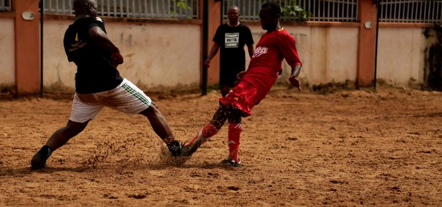 2 Soccer Player Playing For A Ball