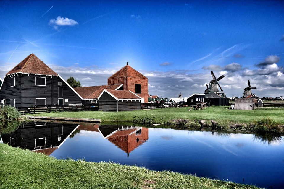 Brown Grey Barn House Near Windmill During Daytime photo