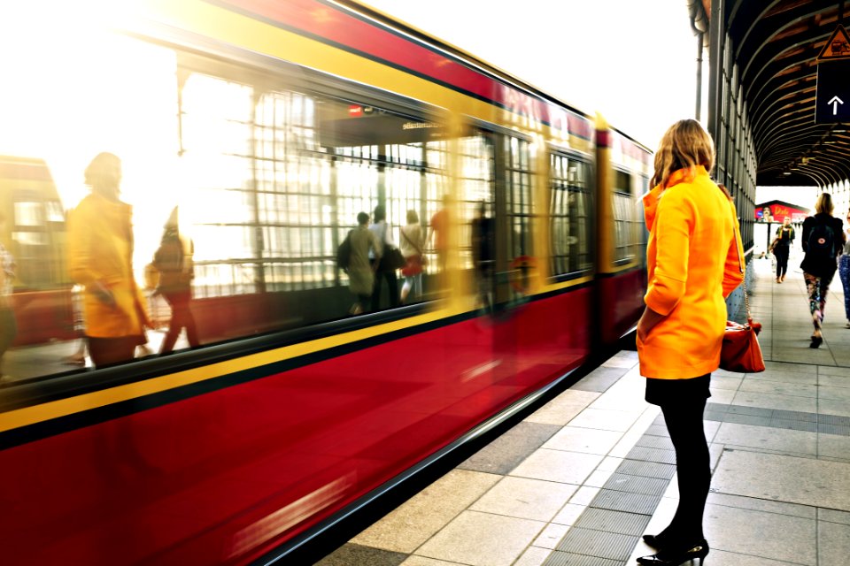 Woman Awaiting Commuter Train In Berlin