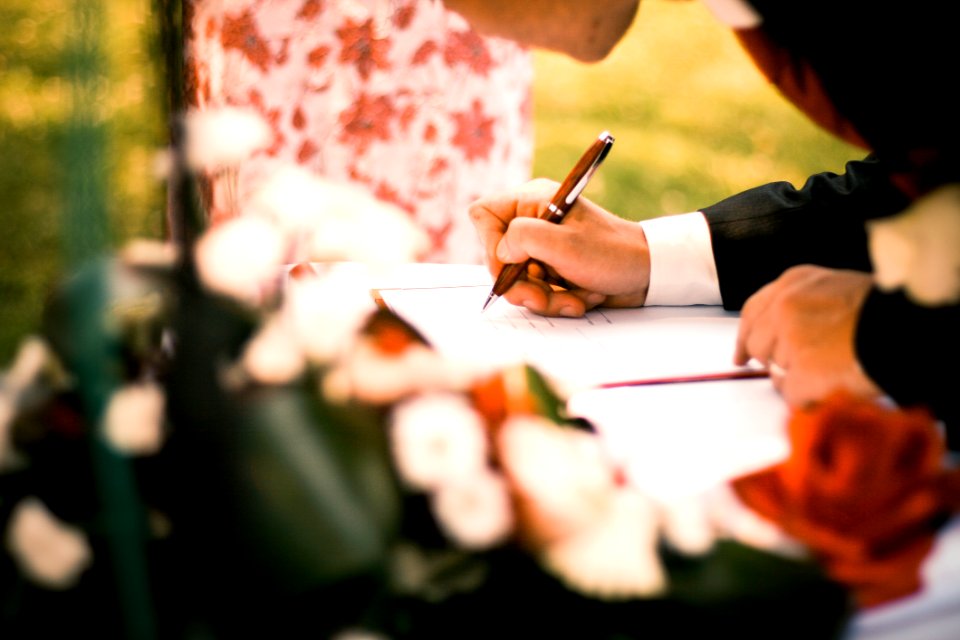 Person Drawing On White Paper photo