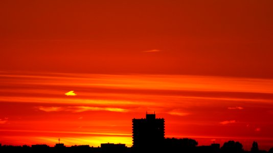 Sunset Over City Skyline photo