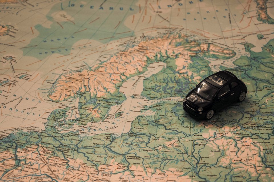Miniature Car Over Map Of Baltic