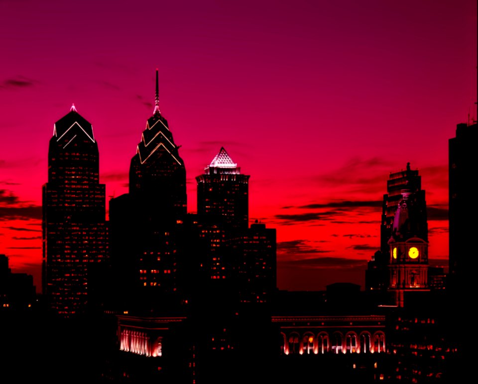 Silhouette Of High Rise Buildings At Sunset