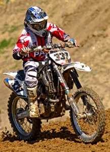 Man Riding Off Road Motorcycle On Trail