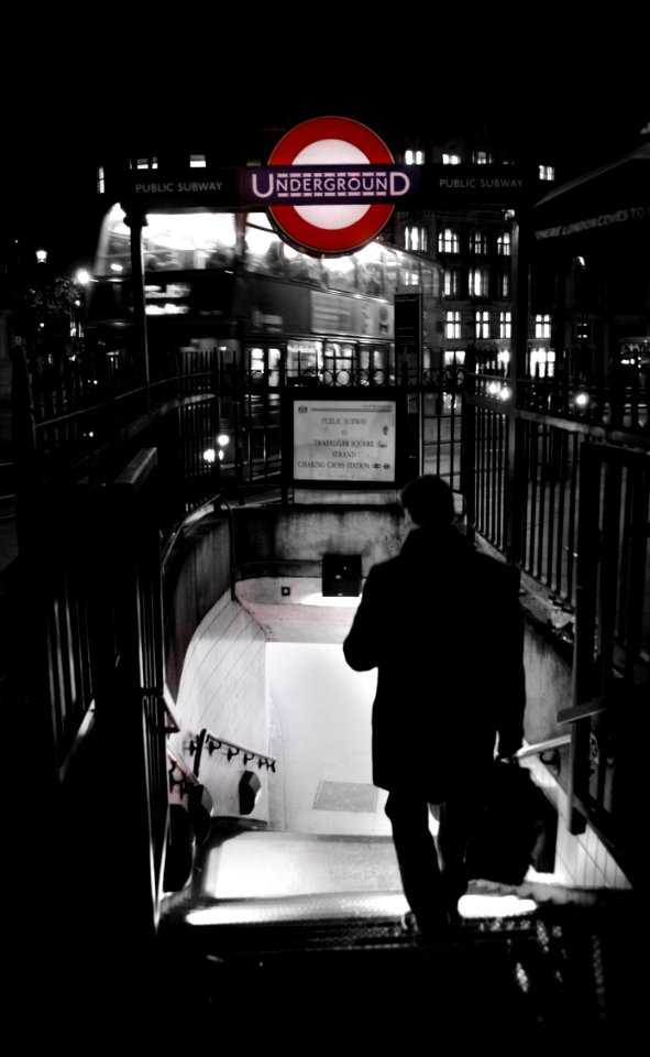 Businessman Walking To Metro Station In London