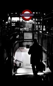 Businessman Walking To Metro Station In London