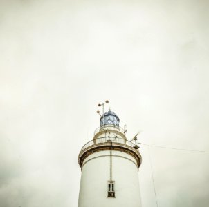 White Light House Under White Sky photo