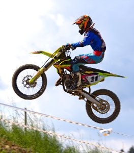 Person Doing Stunt In Motocross Dirt Bike