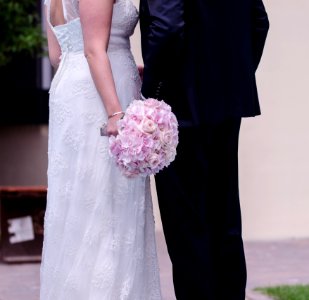 Person Holding Pink Rose Bouquet photo