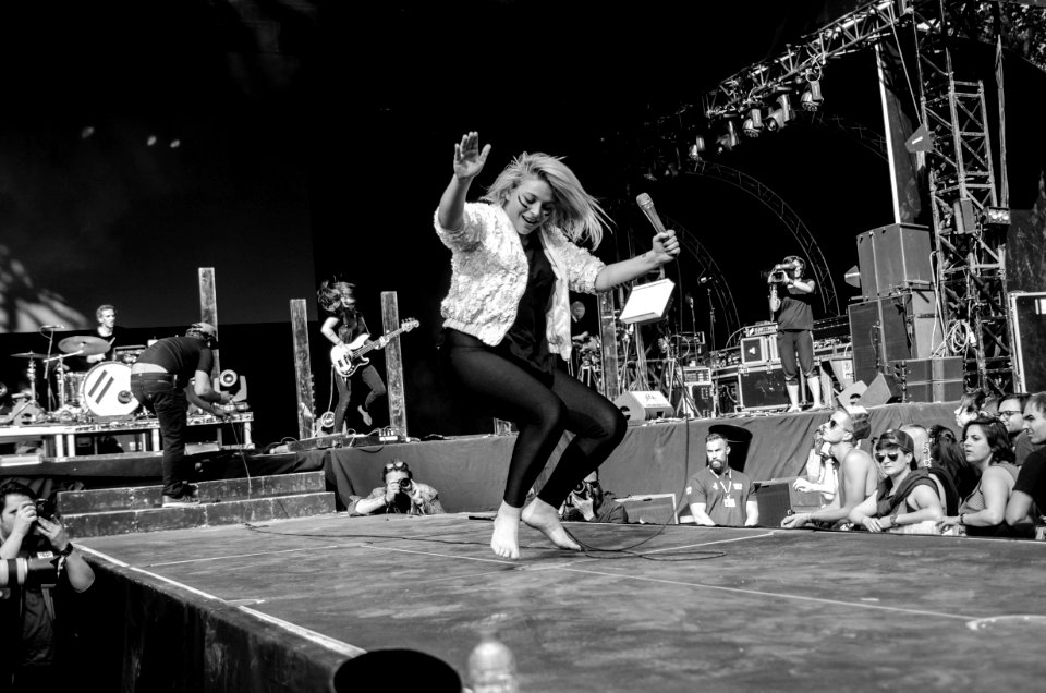 Women Dancing On Stage In Gray Scale Photography