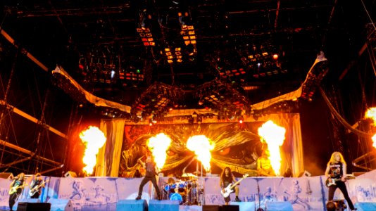 Band Playing On Stage With Fire photo
