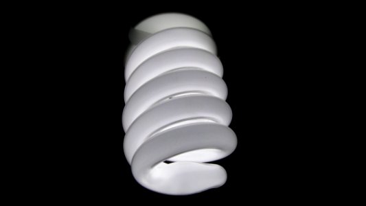 Electric Light Bulb On Black photo