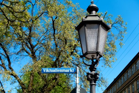 Viktualienmarkt Signage Beside Black Street Light During Daytime photo
