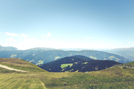 Photography Of Green Hill Mountains During Daytime photo