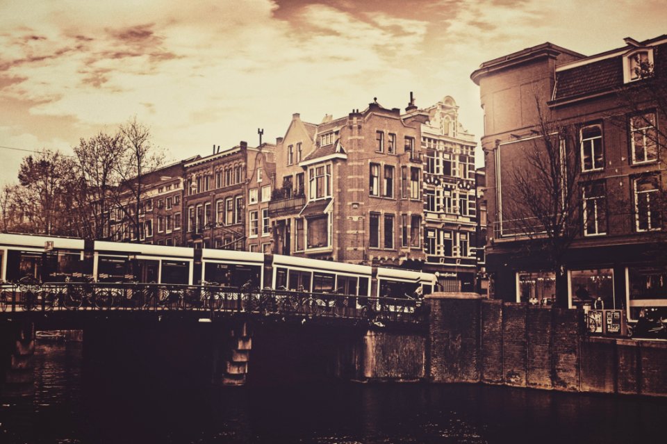 Sepia Photography Of Bridge And Concrete House