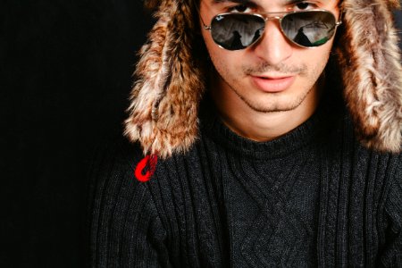 Man With Furry Hat And Sunglasses photo