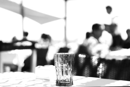 Clear Cut Glass Highball Drinking Glass At The Top Of The Table Selective Focus Photography