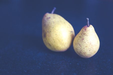Tilt Shift Photo Of Two Pears photo