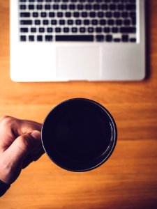 Laptop Computer And Coffee Mug photo