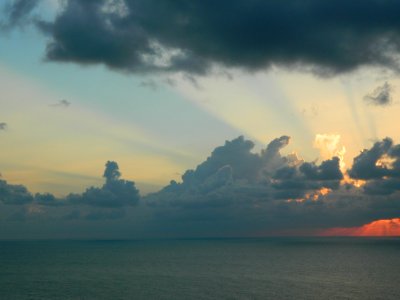 Clouds Over Water At Sunset photo