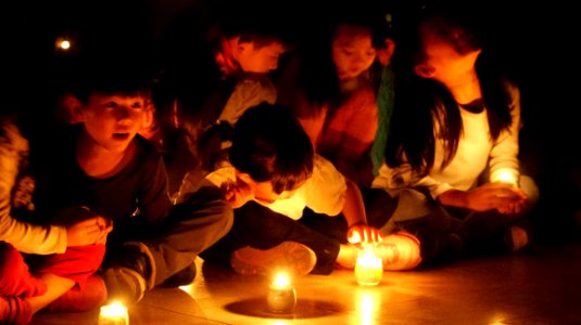 Children At Candlelight Event