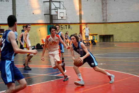 Athletes In Basketball Game