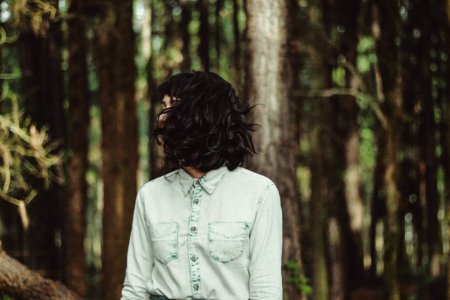 Mystery Woman Emerging From Forest photo