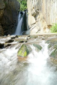 Water Falls Into Rocky Pool photo