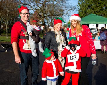 People In Elf Costumes