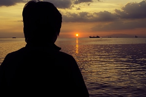 Ocean ship sunset photo