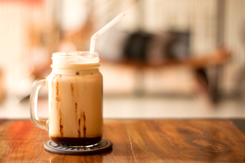 Shallow Focus Photography Of Clear Glass Cup