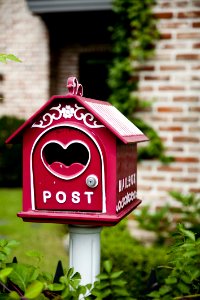 Pink Birdhouse Bird Feeder Signage photo