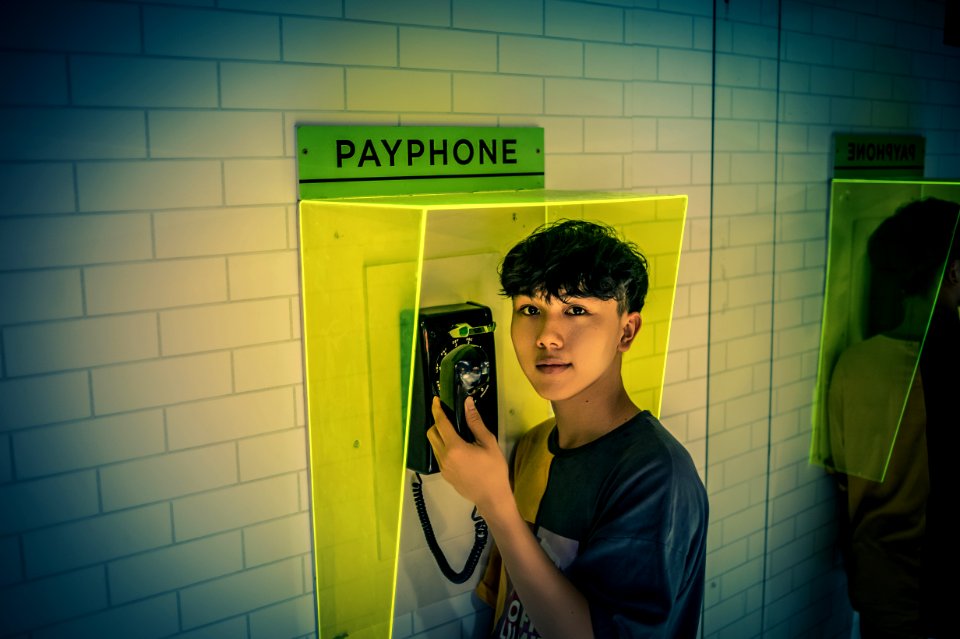 Man Holding Telephone