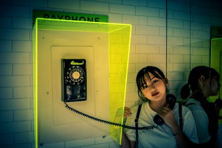 Woman Holding Rotary Telephone photo