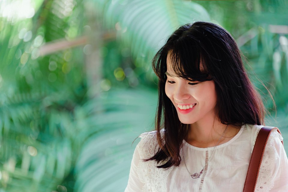 Photo Of Woman Wearing White Outfit Smiling