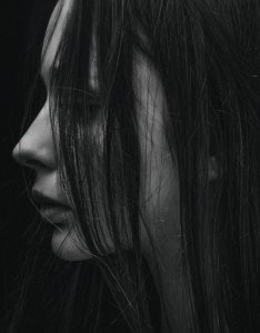Grayscale Photo Of Hair Partially Covering Girls Face photo