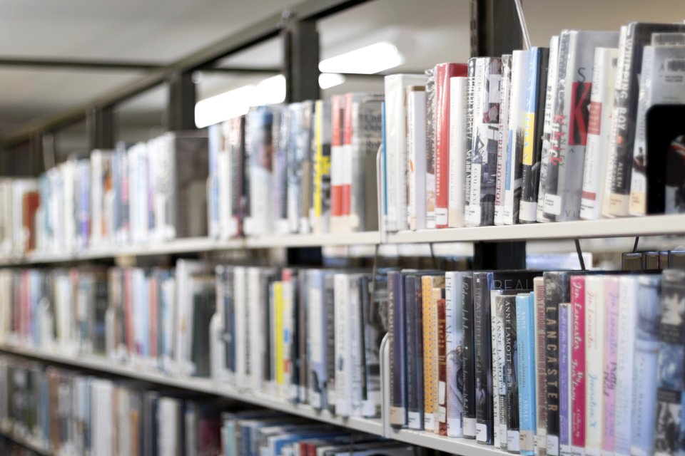 Shallow Focus Photography Of Books On Bookshelves