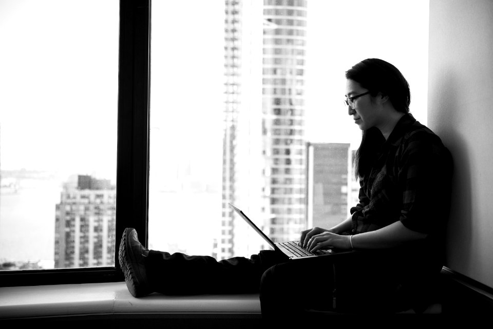 Grayscale Photo Of Woman Wearing Eyeglasses
