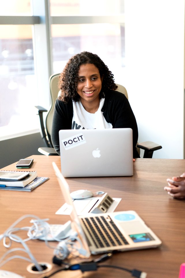 Woman In Front Of Laptop Computer